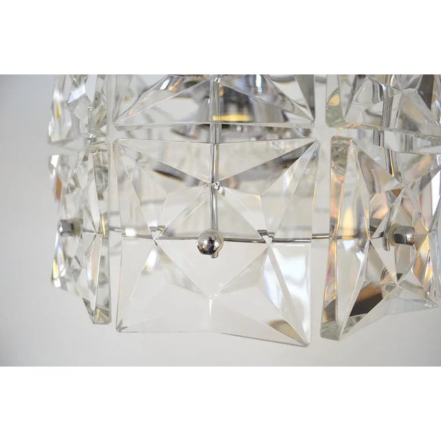 The Kinkeldey's crystal light was designed in the 1960s and consists of a chrome-plated metal frame with two rows (D.32cm...