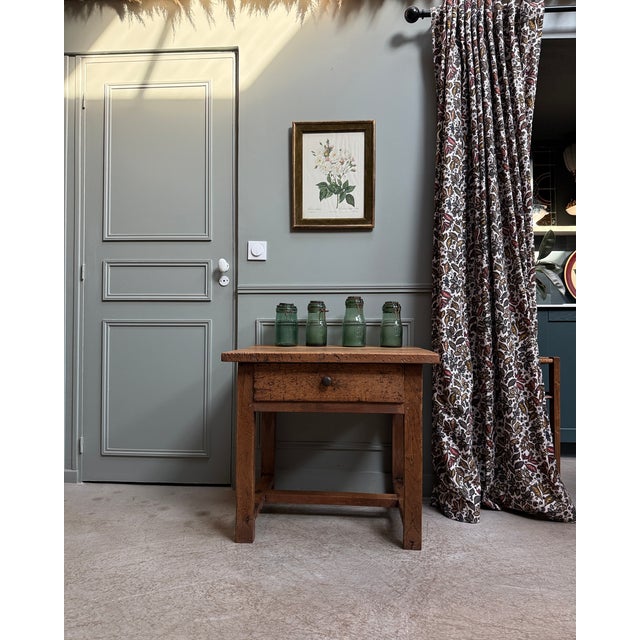 Here is a beautiful antique work table with one drawer, a product of the french peasant furniture tradition. Simple and...