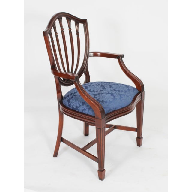 An absolutely fantastic Vintage set of ten Hepplewhite Revival dining chairs. Beautifully hand crafted from solid mahogany...