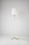 An Italian floor lamp from the 1950s in brass and white lacquered metal, designed in the style of Stilnovo. The lamp is...