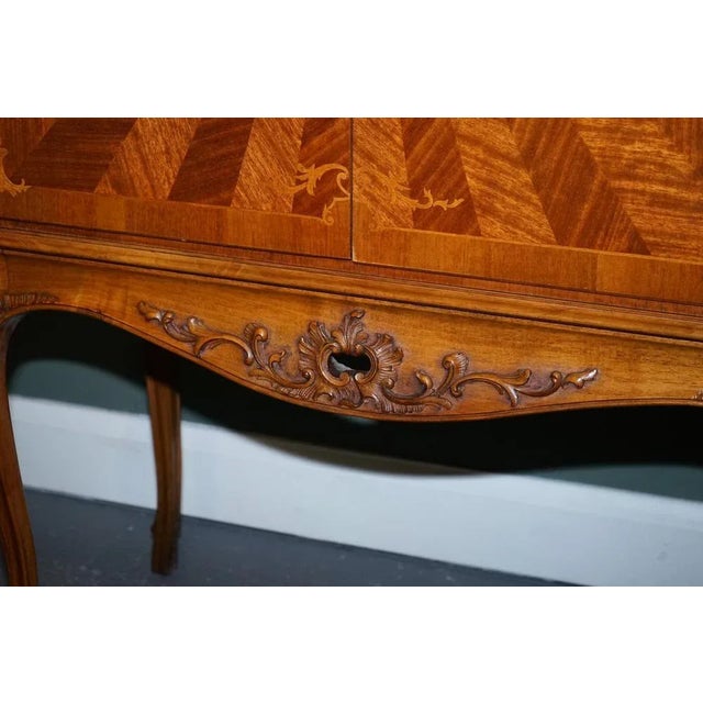 Gorgeous Parquetry French drinks dry cabinet. A very well-made French cabinet made from walnut. The panels were made with...