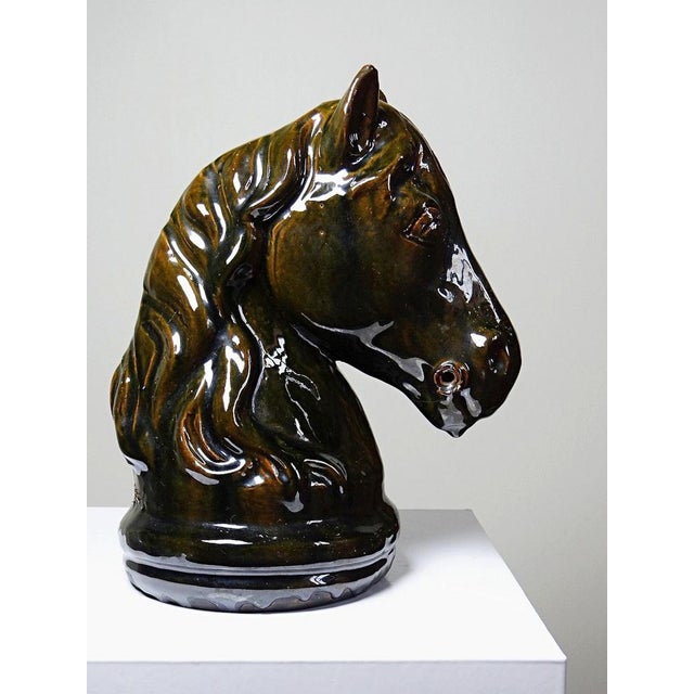 Superb large terracotta horse head, reminiscent of a chess knight, hand-modeled and signed J-B vintage, dated 1988....