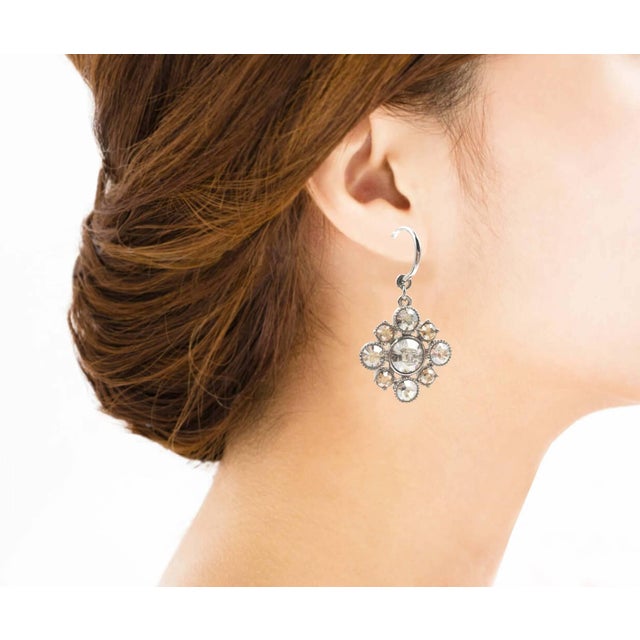 Chanel Silver CC Argyle Crystal Hoop Piercing Earrings *Marked 12 *Made in France -It is approximately 1.75" x 1" -In an...