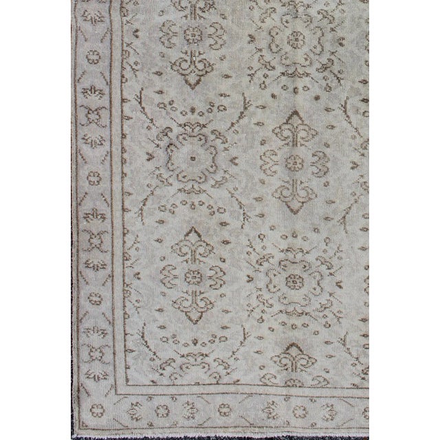 All-Over Design Vintage Turkish Oushak Rug in Shades of Cream and Taupe Stylized all-over design vintage Turkish Oushak...