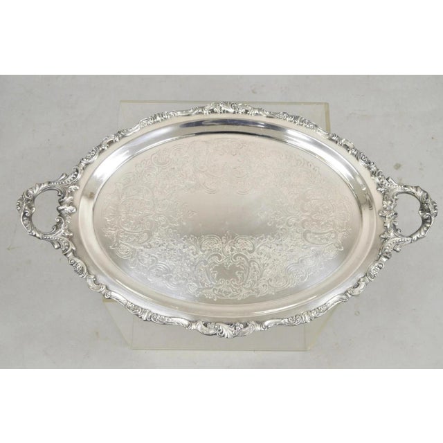 Vintage Baroque by Wallace Oval Silver Plated Victorian Serving Platter Tray. Item features ornate handles, nice heavy...