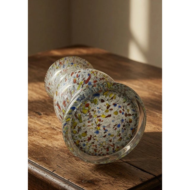 Brighten your home with the vibrant beauty of this vintage Murano-style confetti art glass vase. Expertly hand-blown, this...