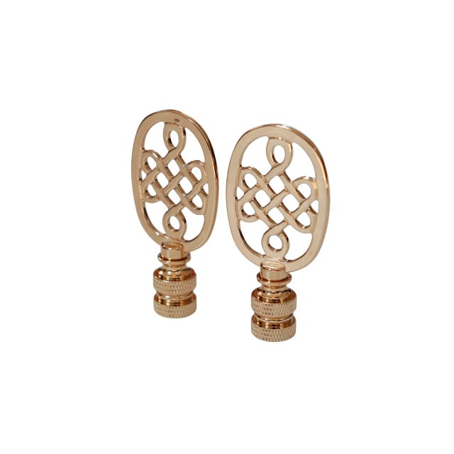 A pair of Celtic knot oval brass lamp finials. Fits a standard size lamp harp. Dimensions per finial. We have more lamp...