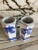 Pair of Chinoiserie hand-painted blue and white porcelain vases with the botanical motif.