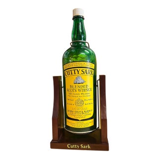 Vintage Mid-Century Modern Large Whisky Display Bottle in Wooden Cradle Stand For Sale