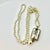 Vintage Home is pleased to present this stunning Christmas Pendant Necklace, after Chanel. The faux pearl necklace is 40”...