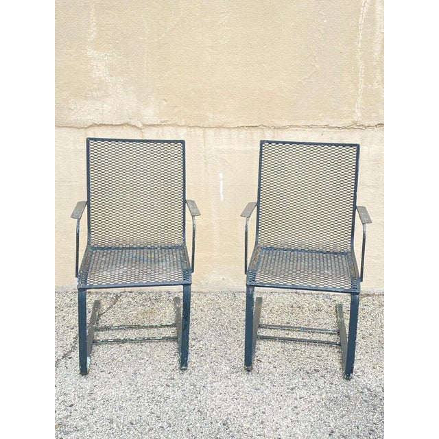 Vintage Industrial Modern Green Heavy Wrought Iron Metal Mesh Cantilever Garden Patio Chairs - a Pair. Circa Mid 20th...