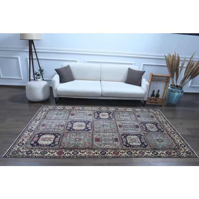 Vintage Hand-Knotted area rug is a semi-antique vintage area rug. The '70s Eastern region of Anatolian's unique rug is...