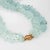 Finely detailed estate Gump''s double strand aquamarine necklace finished with a 14k yellow gold clasp. Tumbled aquamarine...