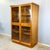 A unique cabinet with the clean proportions of late Art Deco. The rounded corners of the top panel continue into the outer...