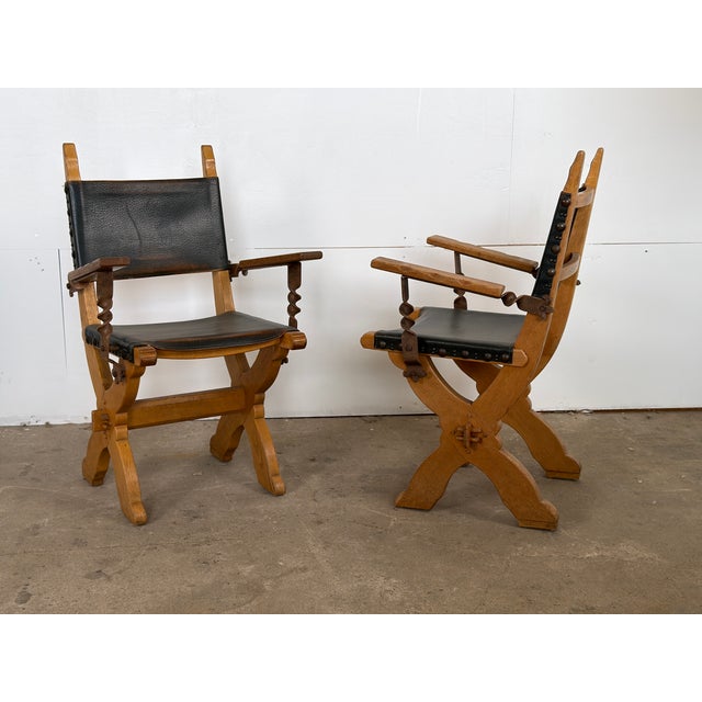 Dutch set of six dining chairs in solid oak and leather, designed by Bram Sprij, 1960s, comprising two armchairs and four...