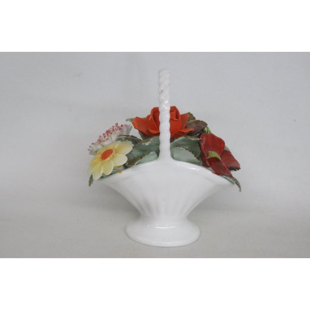 This gorgeous Floral Basket Figurine is made of bone china. This darling collectible is marked on the bottom with the...