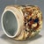 Add a touch of vibrant Eastern artistry to your home with this beautiful porcelain jar. Featuring a classic cylindrical...
