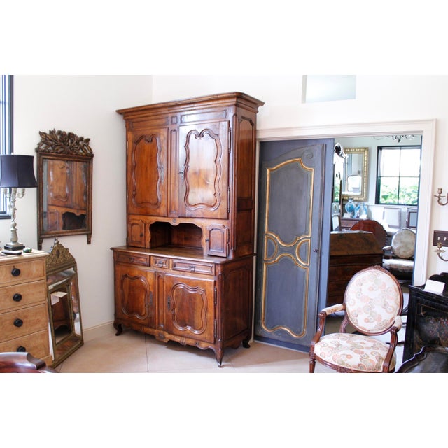 A large and very handsome buffet à deux corps, traditional French two part cupboard. The cabinet below is fitted with one...