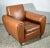 Brown leather armchair with the option of adding a separate footstool. Italy, 1970. Dimensions: 93.5 cm x h 78.5 cm x seat...