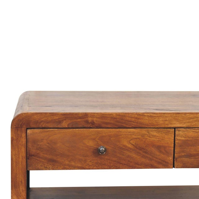 The Chestnut-Finish Mango Wood Curved Coffee Table brings a refined balance of craftsmanship, character, and everyday...