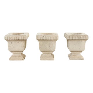 Set of Three Neoclassical Style Carved Stone Urn Planters For Sale