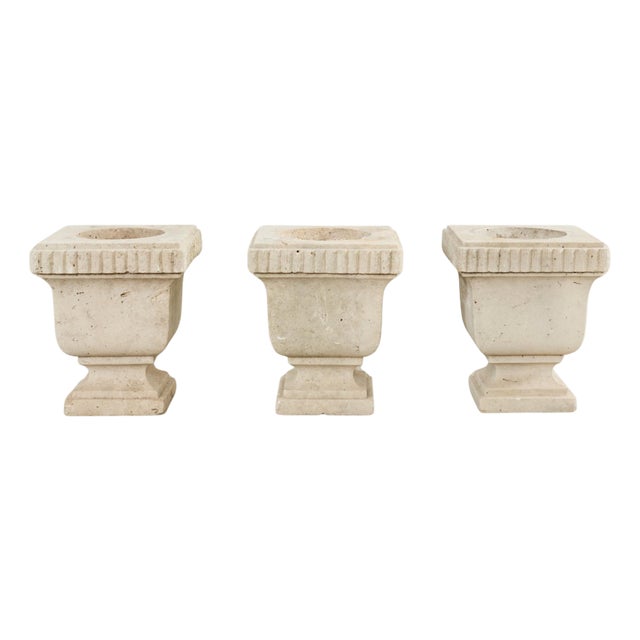 Set of Three Neoclassical Style Carved Stone Urn Planters For Sale
