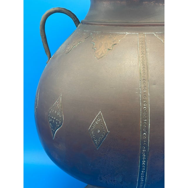 Antique Arts & Crafts Hand-Hammered Copper Urn with Riveted Seams, c. 1890–1915 Exceptional antique hand-hammered copper...