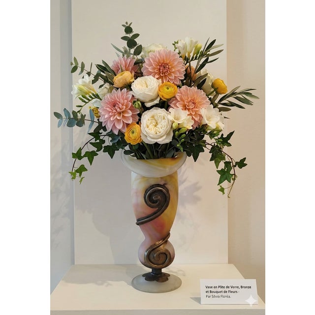 Freehand blown glass and metal vase. The copper, nickel, and brass were applied using electrolysis and finished with a...