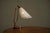 This is a truly wonderful articulating mid century table lamp in beautifully patinated brass and perforated white...