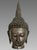 An eye catching image of a Shan style Buddha with its own carved wood stand/plinth. Identified as a depiction of...