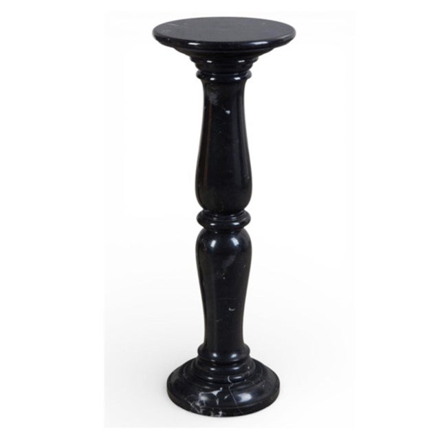 This is a stunning pair of black marble pedestals in a neoclassical style. Both pedestals are in very good condition with...