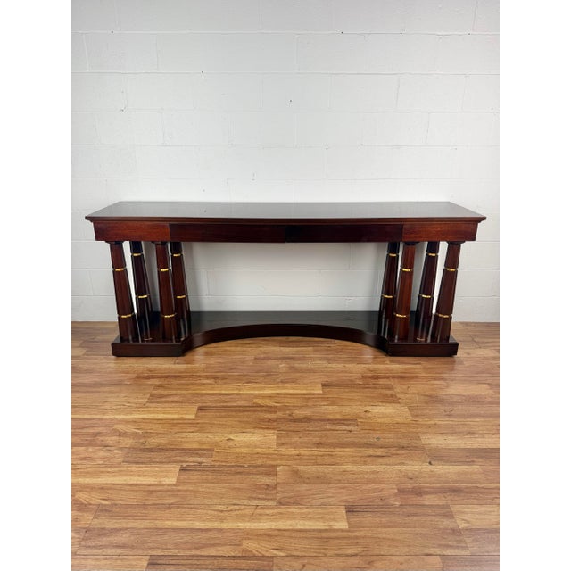 Baker's Column Sideboard from The Thomas Pheasant Collection. Features include Mahogany wood in a Sable finish with brass...