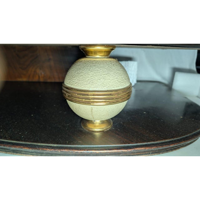 Introducing a captivating, mid-century sideboard with its own unique, peculiar design; created by renowned Italian...