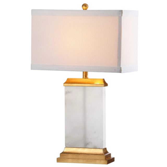 The grandeur and timeless beauty of this modern alabaster table lamp make it a instant focal point. Designed with striking...
