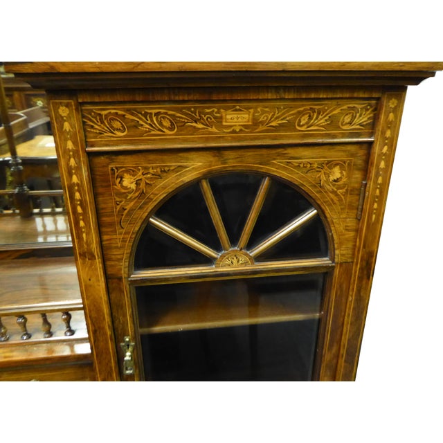 For sale is a very good quality Edwardian rosewood and inlaid cabinet. The top of the cabinet has three beveled mirrors,...