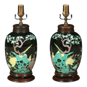 A Pair of Black Chinese Porcelain Lamps With Floral Design on Wood Base