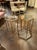 The Pair of MCM Mastercraft Brass Side Tables is a set of stylish and elegant furniture. Crafted from brass with bamboo...