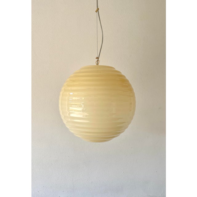 Modulo s40 amber, designed by toso - massari for leucos is an elegant and refined chandelier in authentic murano glass,...