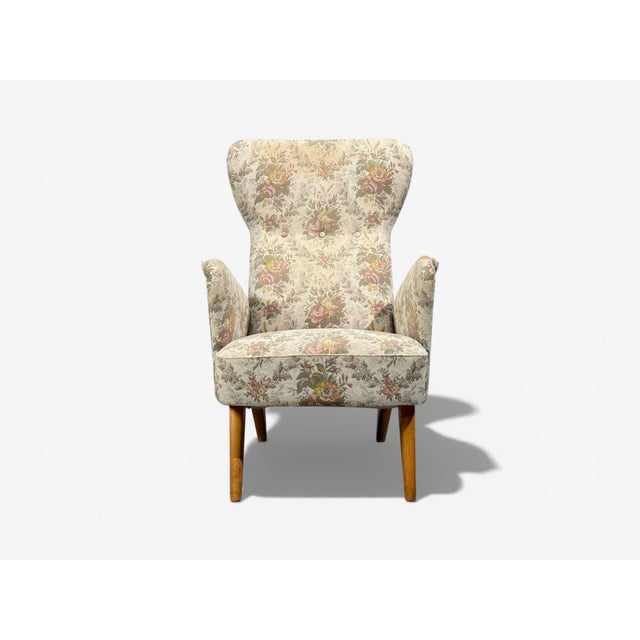 Carl Gustaf Hiort af Ornäs, Finnish Mid-Century Modern, Armchair, Fabric, Lacquered Wood, Finland, 1940s A single floral...
