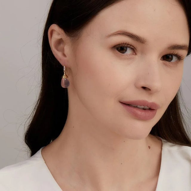 Created in 18kyg Rose Quartz 20 carats approx. Diamonds 0.05 carat approx. Limited edition Hailing from 18 karet yellow...