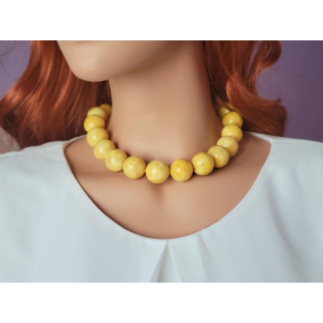 Introducing a one-of-a-kind piece of Baltic amber jewelry that is sure to take your breath away. This necklace is created...