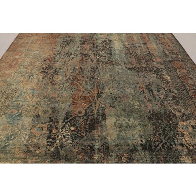 Hand-knotted in luxurious wool, this captivating 9x12 rug from Rug & Kilim’s Modern Collection is a powerful study in...