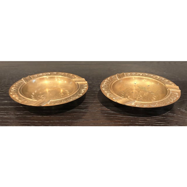 This pair of vintage etched solid brass ashtrays were produced in India, please see the stamp on the underside in the...