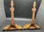 A striking pair of vintage giltwood-style wall brackets in the neoclassical Hollywood Regency taste. Featuring dramatic...