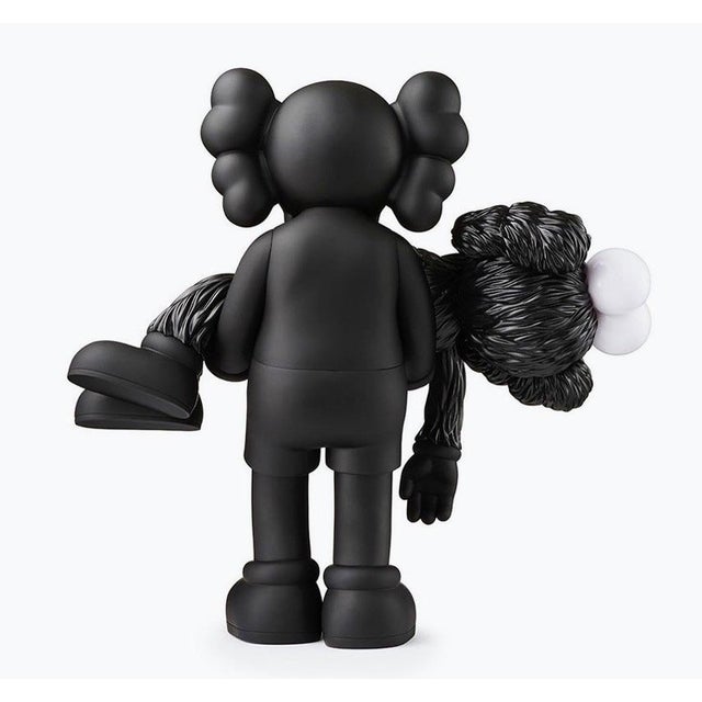 KAWS GONE black new in original packaging. Cast Resin figure. 2019. 14.25 x 7 x 7 inches Accompanied by original box;...