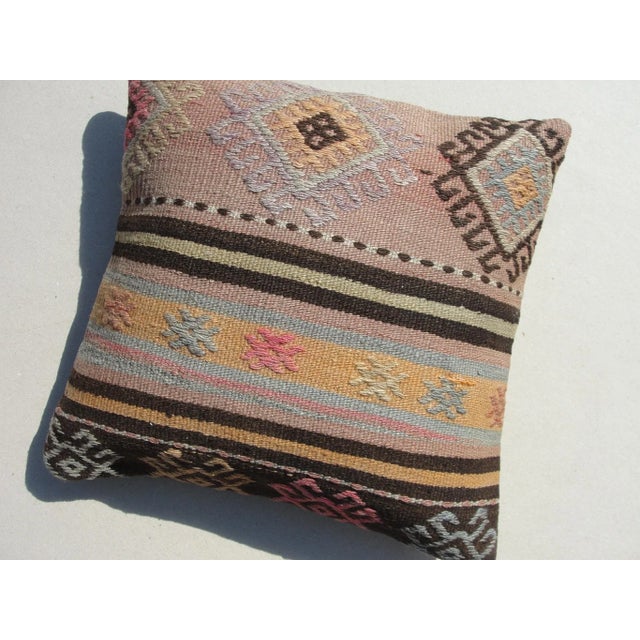 Kilim Rug Pillow Made from old turkish kilims Back side cotton and has closed with a solid hidden zipper size:16" x 16" It...