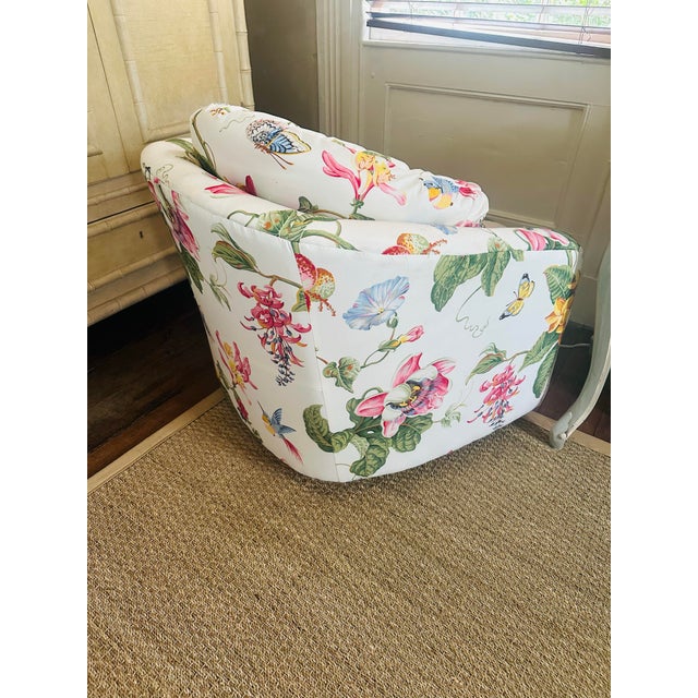 This vintage swivel chair has a wonderfully inviting, sculptural presence, made all the more striking by its reupholstery...