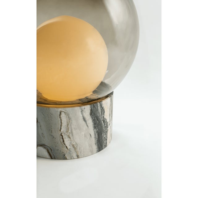 Sebastian Herkner’s boule is a pure homage to the traditional French Pétanque game, a version of boule. The object toys...