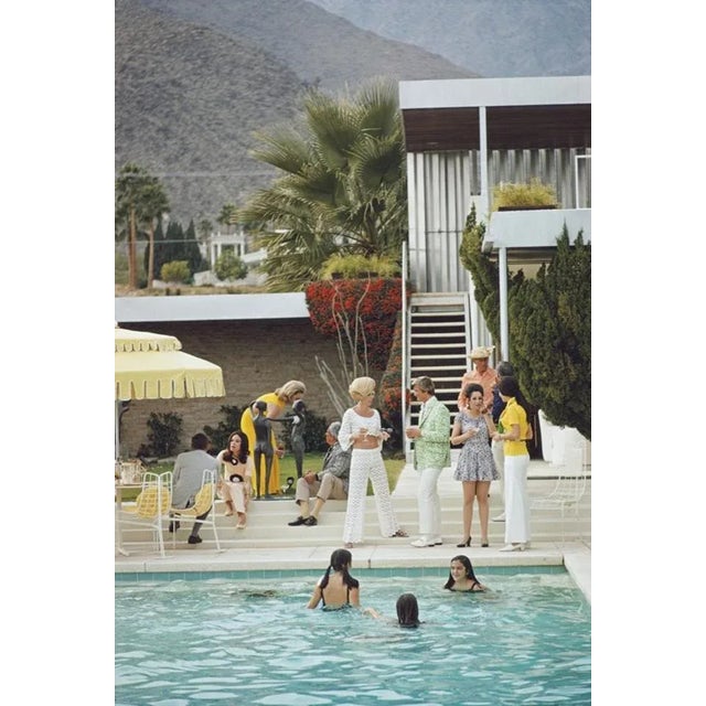 Party on the Steps 1970 by Slim Aarons Slim Aarons Limited Estate Edition Guests by the pool at Nelda Linsk’s desert house...