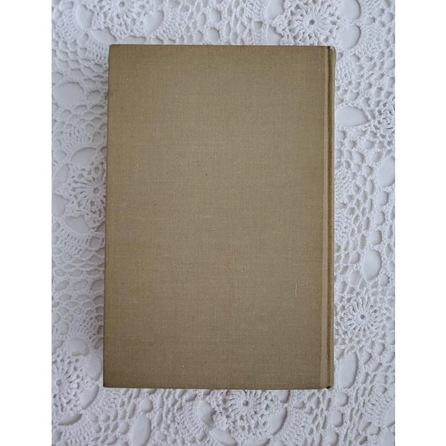 Melting Pot of Mennonite cookbook featuring classic recipes from 1874-1974. Measuring 9 ¼” x 6 ¼” x 1 ¼” and showing...